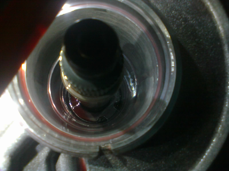 There is a snap-ring DEEP down below.